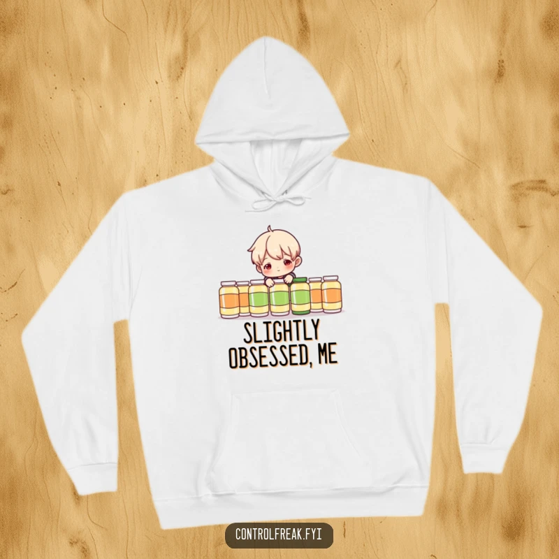 Funny Hoodie: Character playfully nudging objects in a perfectly aligned row, radiating a charmingly mischievous vibe.