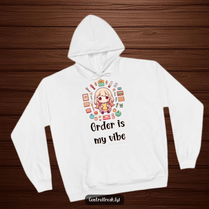 Funny Hoodie featuring a happy character creating a beautiful, symmetrical arrangement of items with playful precision, celebrating order.