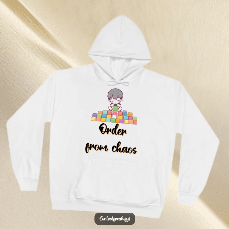 Funny hoodie showing a small character meticulously organizing colorful blocks into perfect rows, perfect for cozy order.
