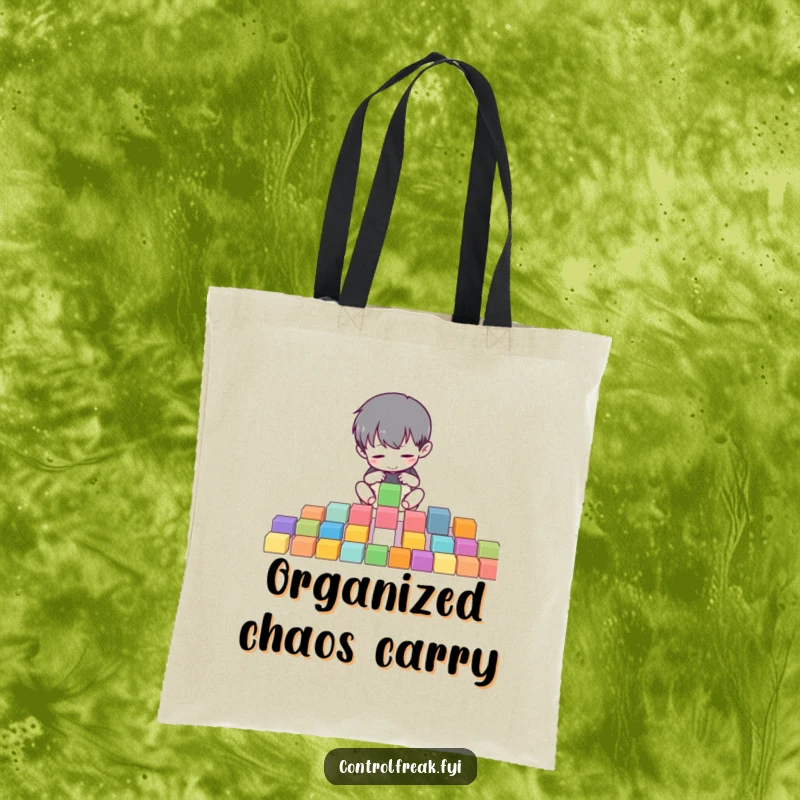 Funny tote bag featuring a small character intently organizing colorful blocks into perfect rows, great for carrying essentials neatly.
